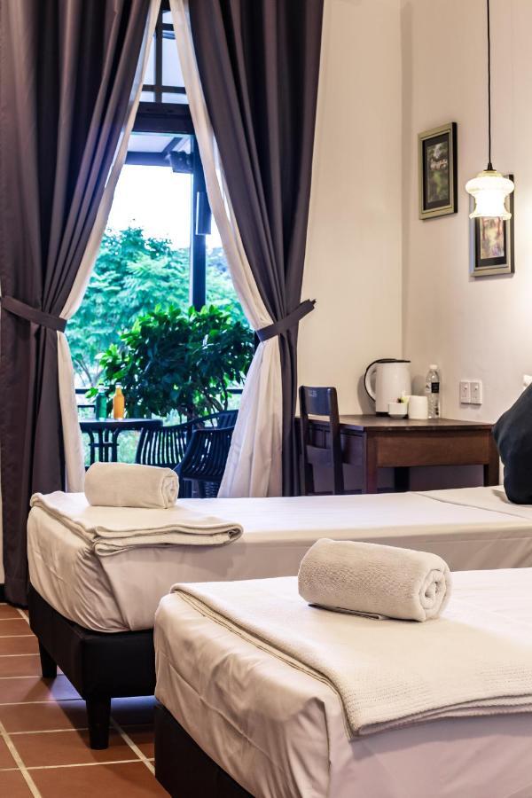 The Marian Boutique Lodging House Кучинг Екстериор снимка